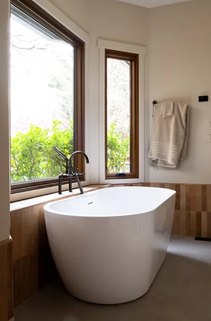 Modern Bathtub Addition with Mode Homes